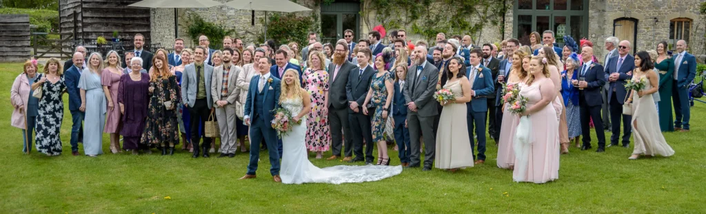 Damien & Laura Wedding-8350-138 colour-9 Choosing a wedding photographer: A large wedding group photo taken by Dick Lloyd