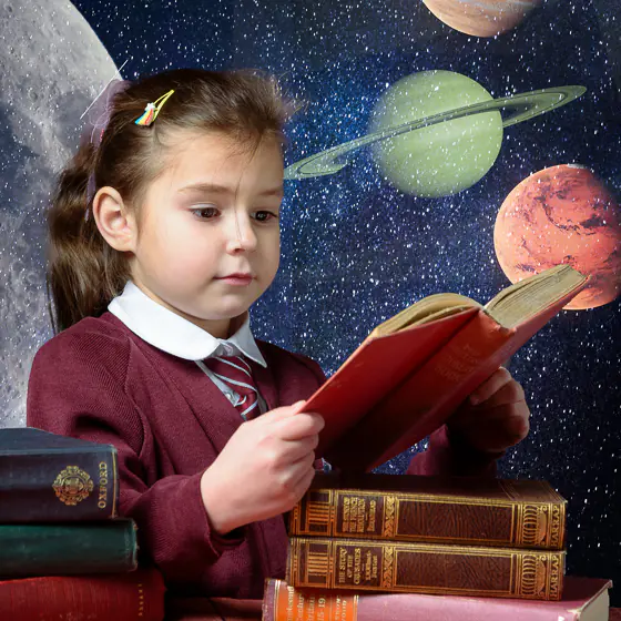 Young girl in school uniform reading a book, with a fantasy galaxy background of planets and stars.