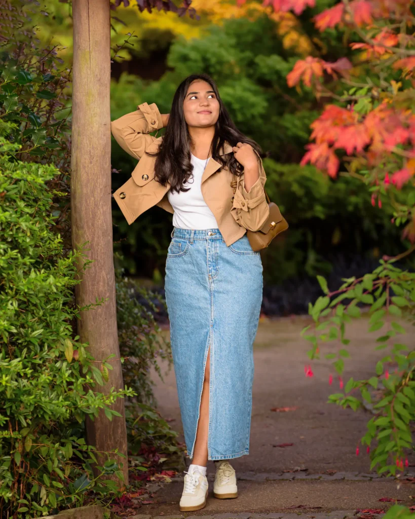 Hina-126-Edit Full body portrait of a young woman surrounded by autumnal leaves, captured byDick Lloyd Photography