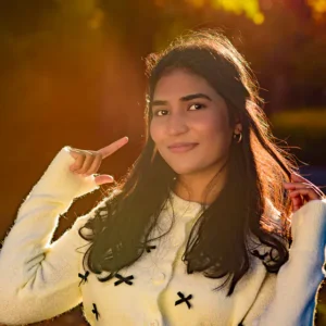 Portrait of a young woman backlit by an autumnal sunset, captured by Dick Lloyd Photography