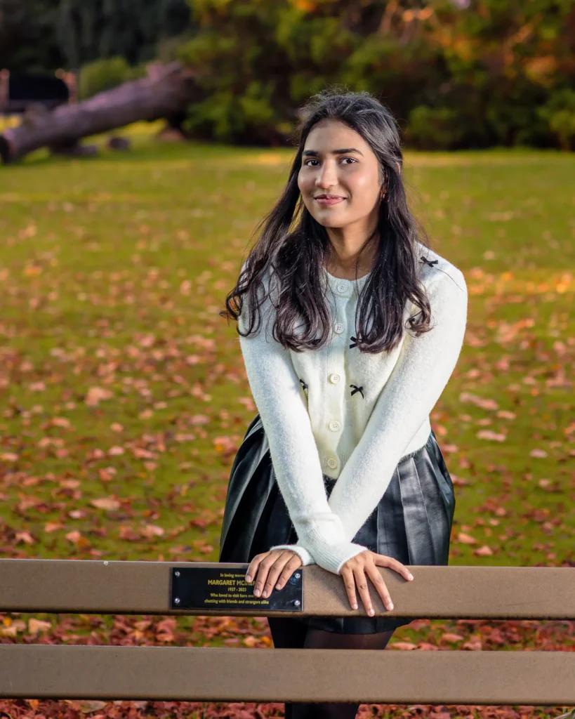 Hina-43-Edit Half body portrait of a young woman leaning on a bench, captured by Dick Lloyd Photography