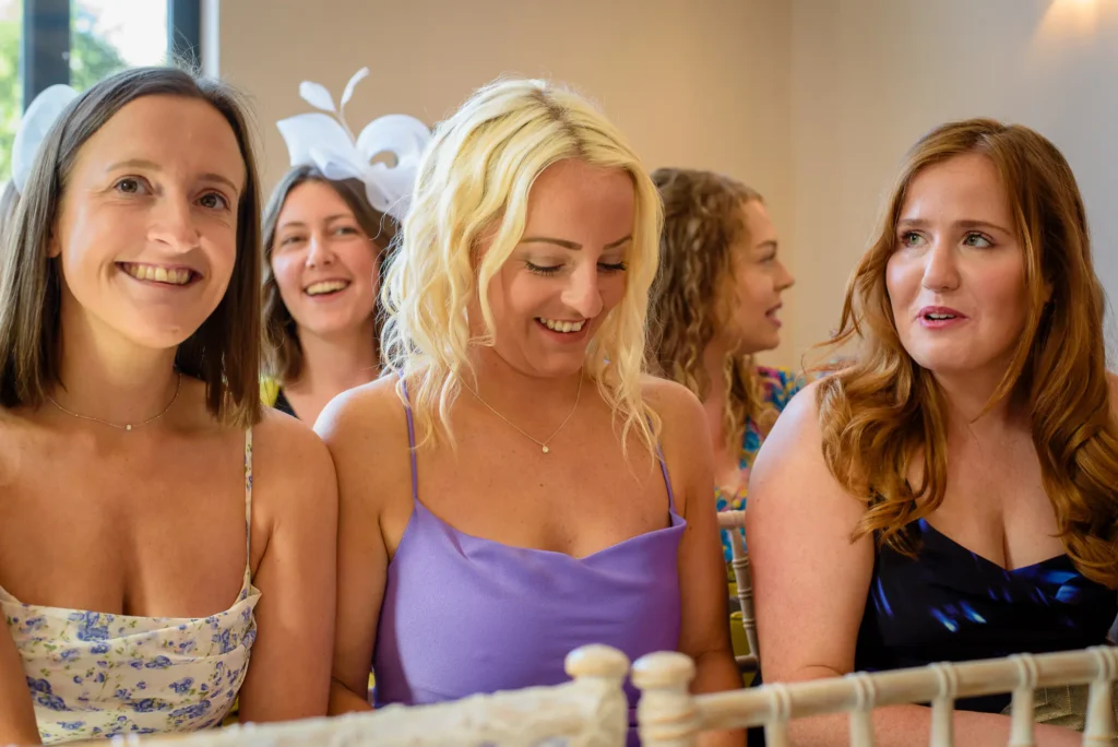 Angharad & Lewis Wedding-0945 Wedding guests awaiting the arrival of the bride, captured by Dick Lloyd Photography