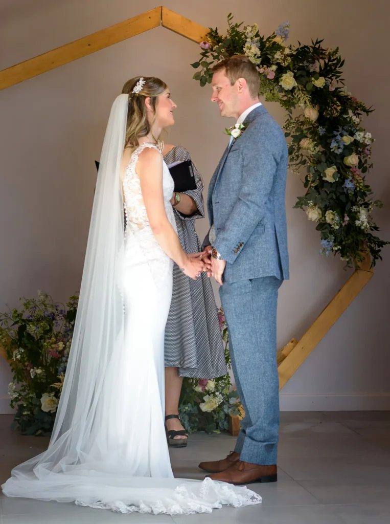Angharad & Lewis Wedding-0987 Bride and Groom saying their wedding vows, captured by Dick Lloyd Photography