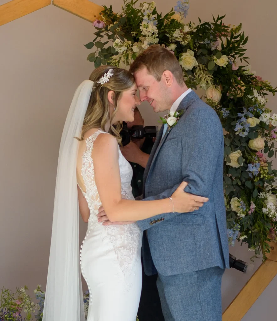 Timeless Memories Collection – Wedding Day Storytelling by Dick Lloyd Photography Bride and groom sharing an intimate moment during their wedding ceremony, captured by Dick Lloyd Photography, a Yorkshire wedding photographer.